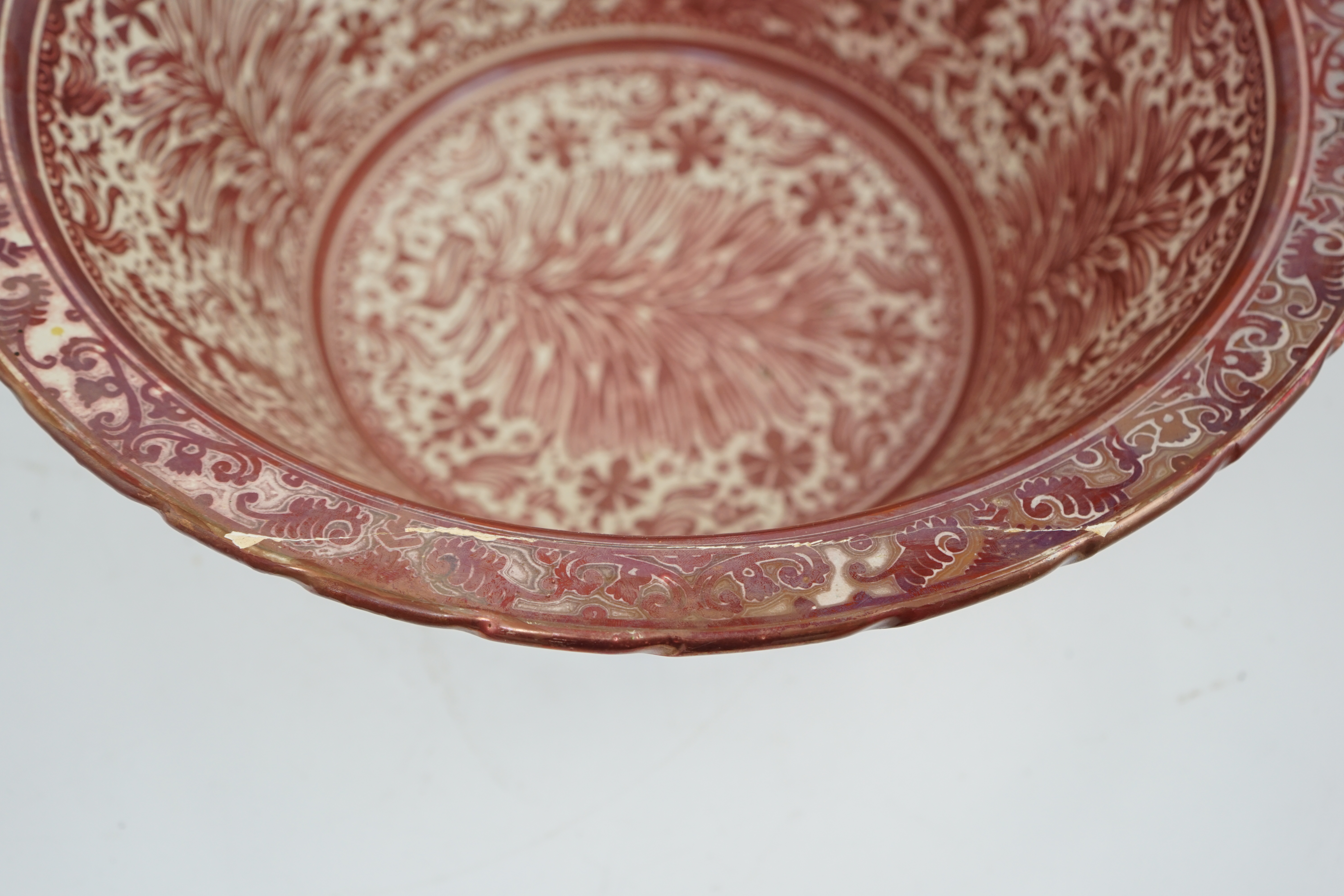 Ulisse Cantagalli, a large Hispano-Moresque style ruby-copper lustre basin, c.1900, some restoration